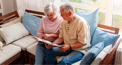 two people looking at a book