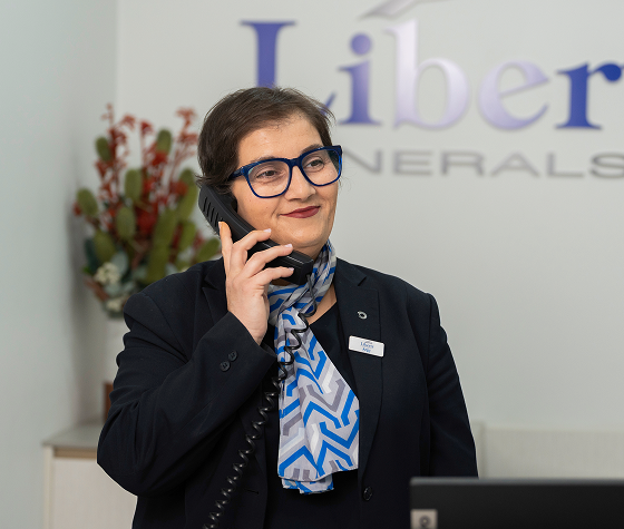 Liberty funeral director on the phone