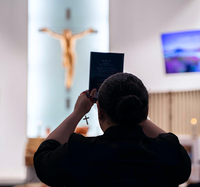 woman conducting a prayer