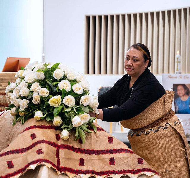a woman arranging flowers